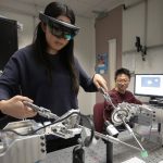 Computer science doctoral students test an augmented reality surgical training tool