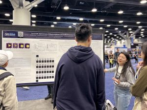 Lin Tian presents a research poster at CVPR 2023