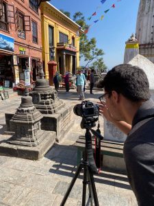 Bibhor Bista sets up a DSLR camera for photogrammetry in Swayambhu.